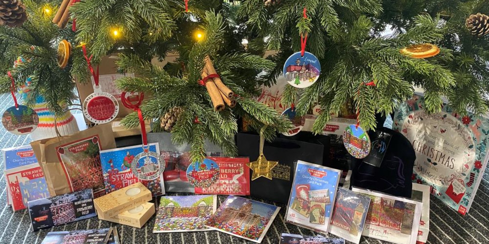 Christmas gifts underneath a decorated tree at Strawberry Field